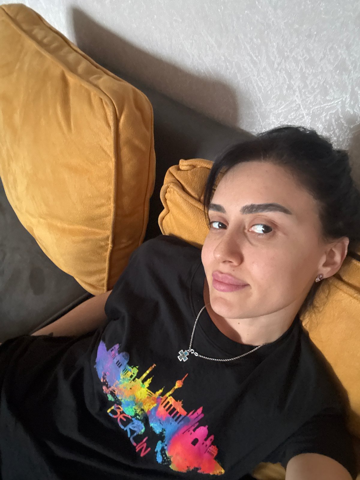 Person documented relaxing and taking elevator selfies in Tbilisi
