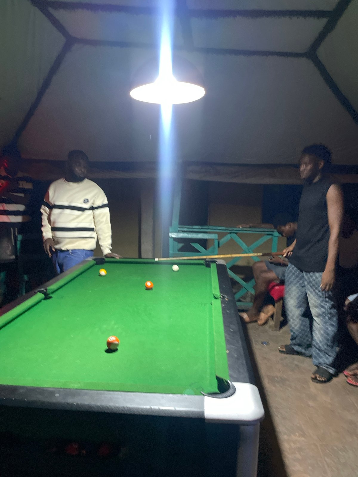 Evening pool game draws crowd in Lokoja recreational hall