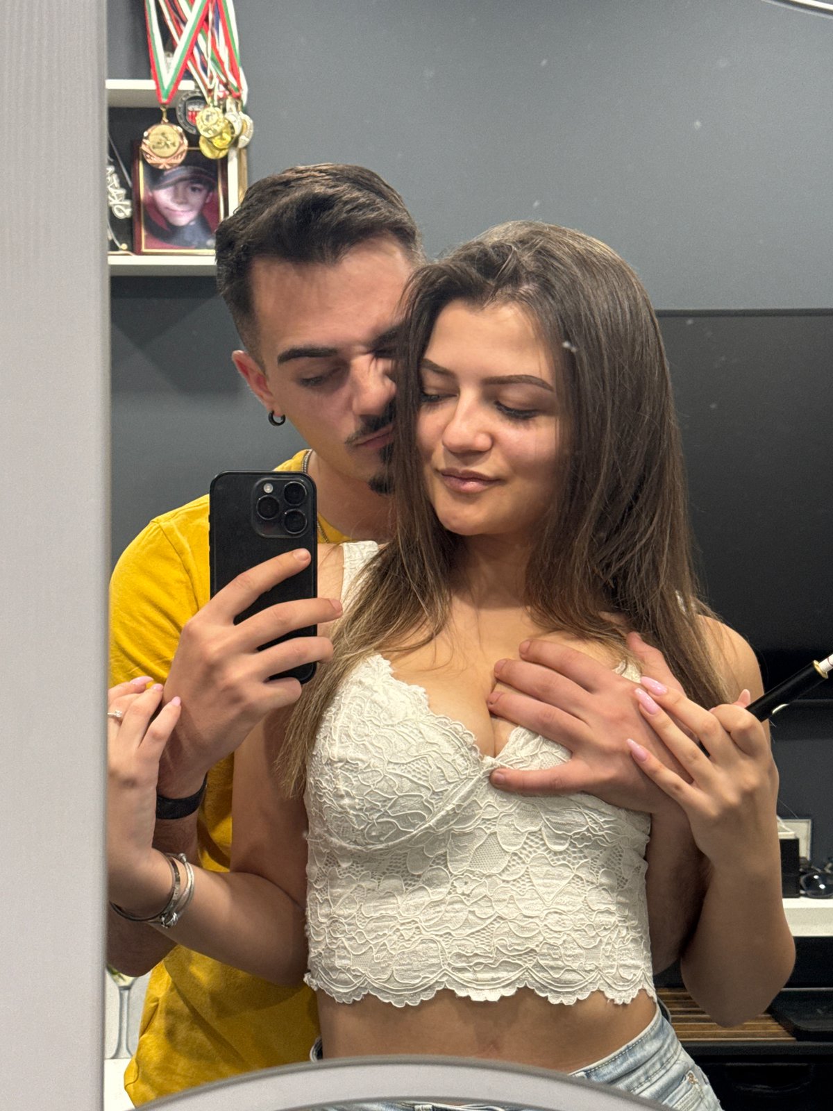 Woman captures mirror selfie in decorated Sofia apartment