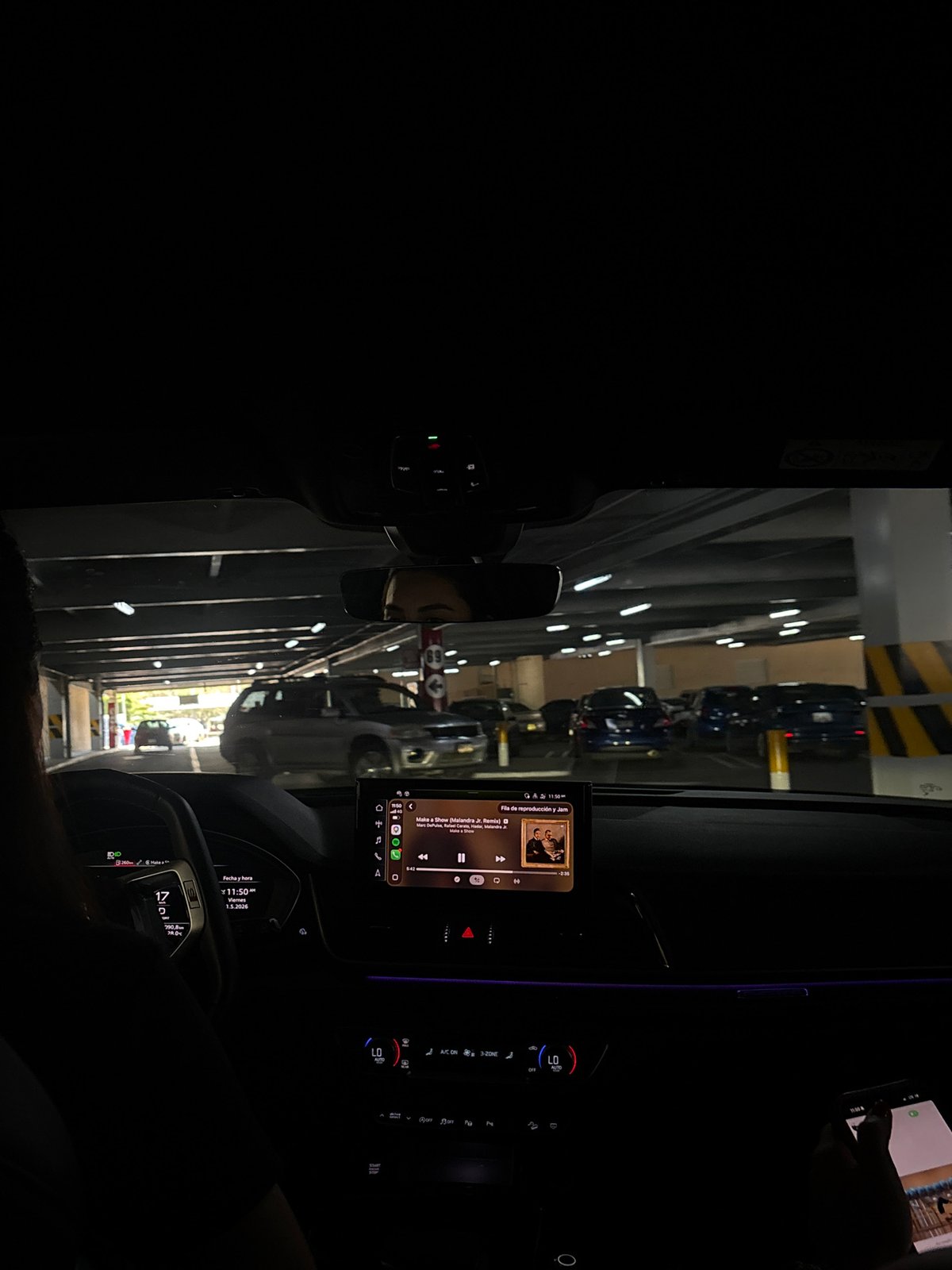 Evening shopping and parking garage navigation documented in Puebla