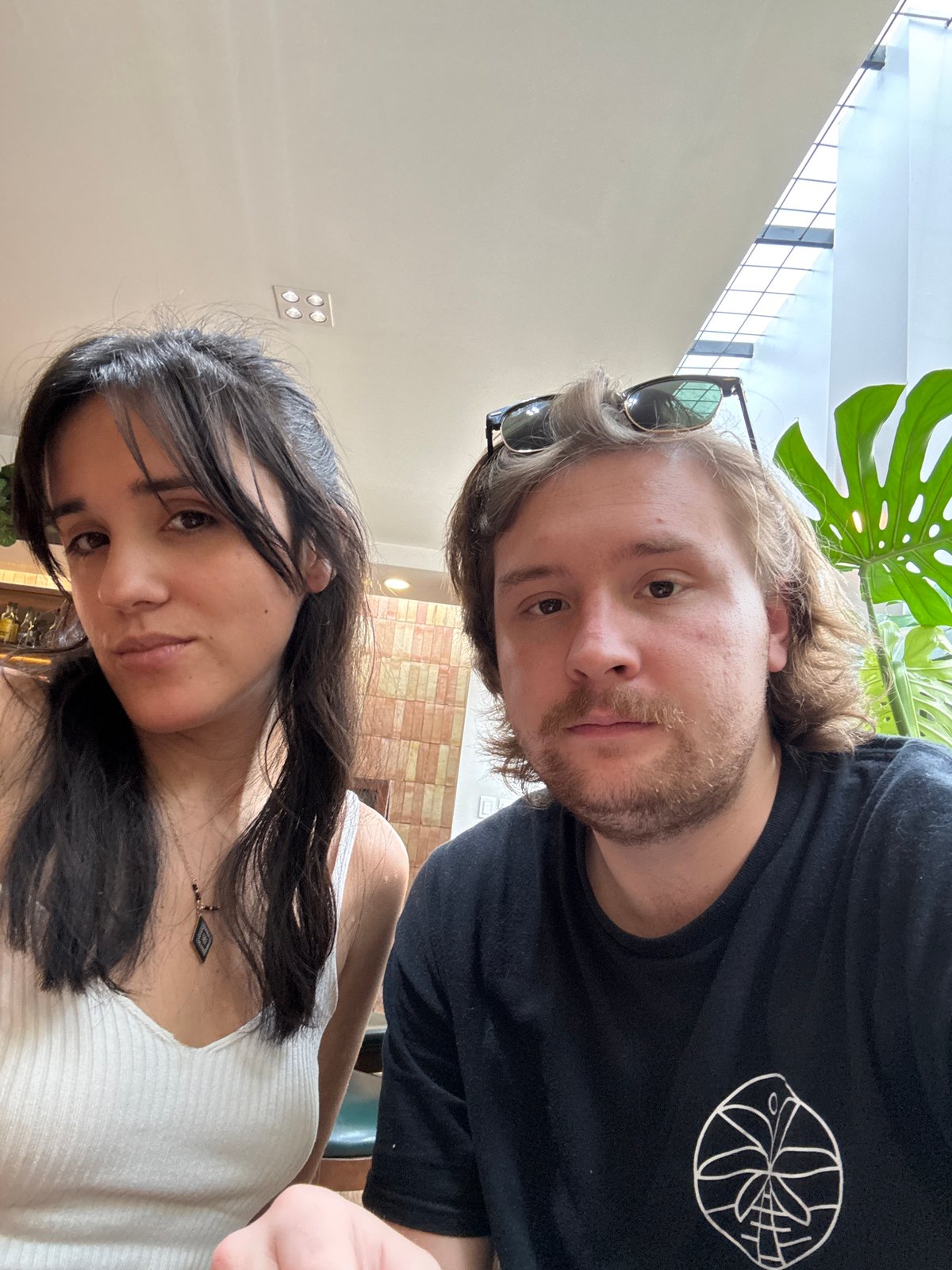 Couple photographed taking selfies indoors in Cuautitlán Izcalli