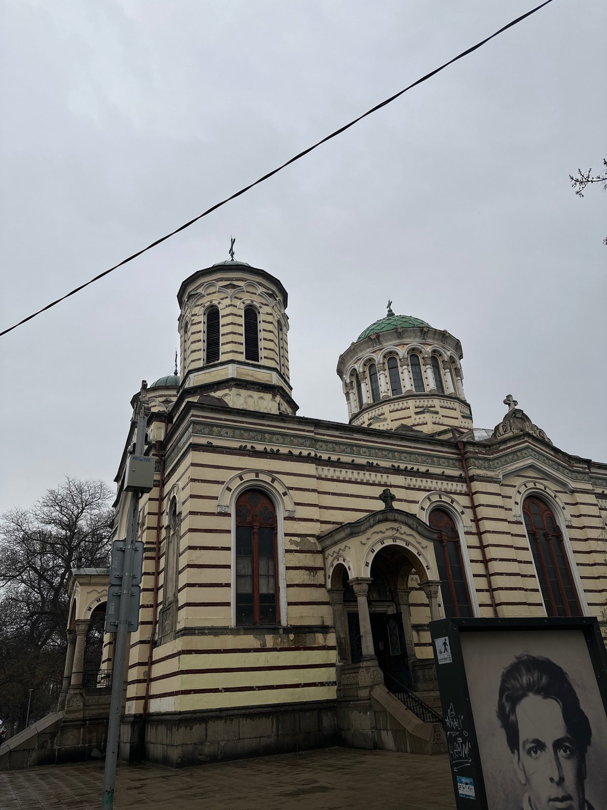 Pedestrians with umbrellas spotted near Sofia landmarks