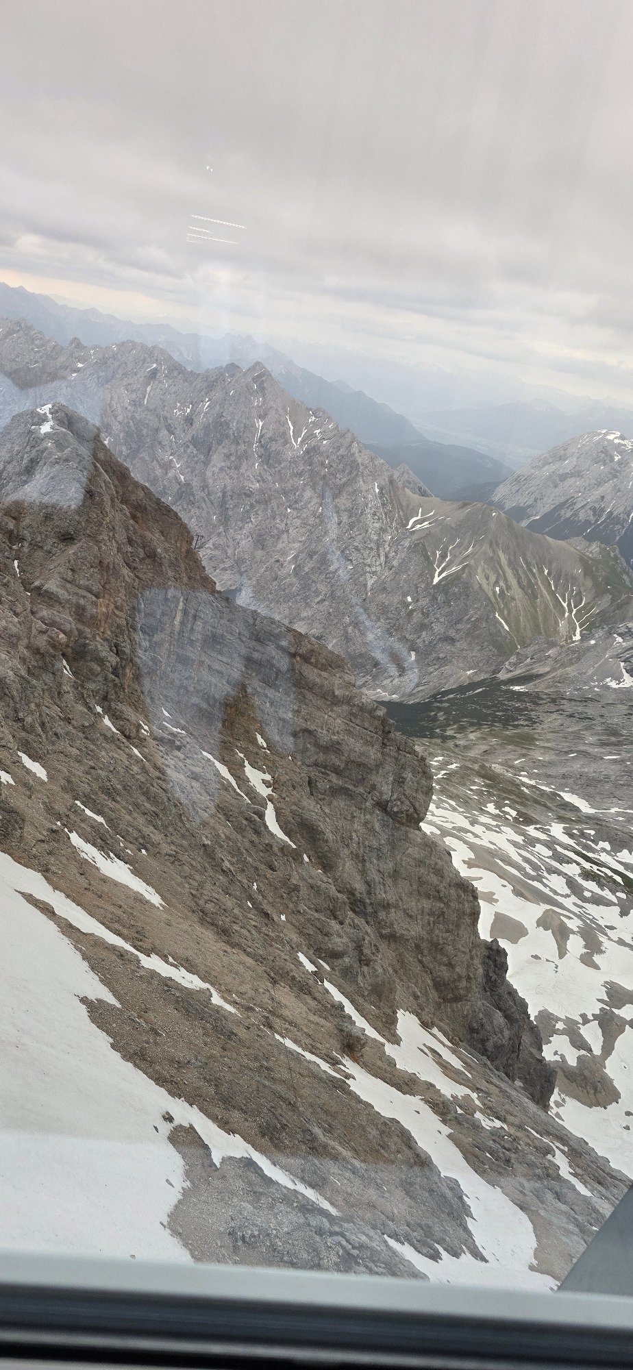 Morning at the Zugspitze summit and cable cars