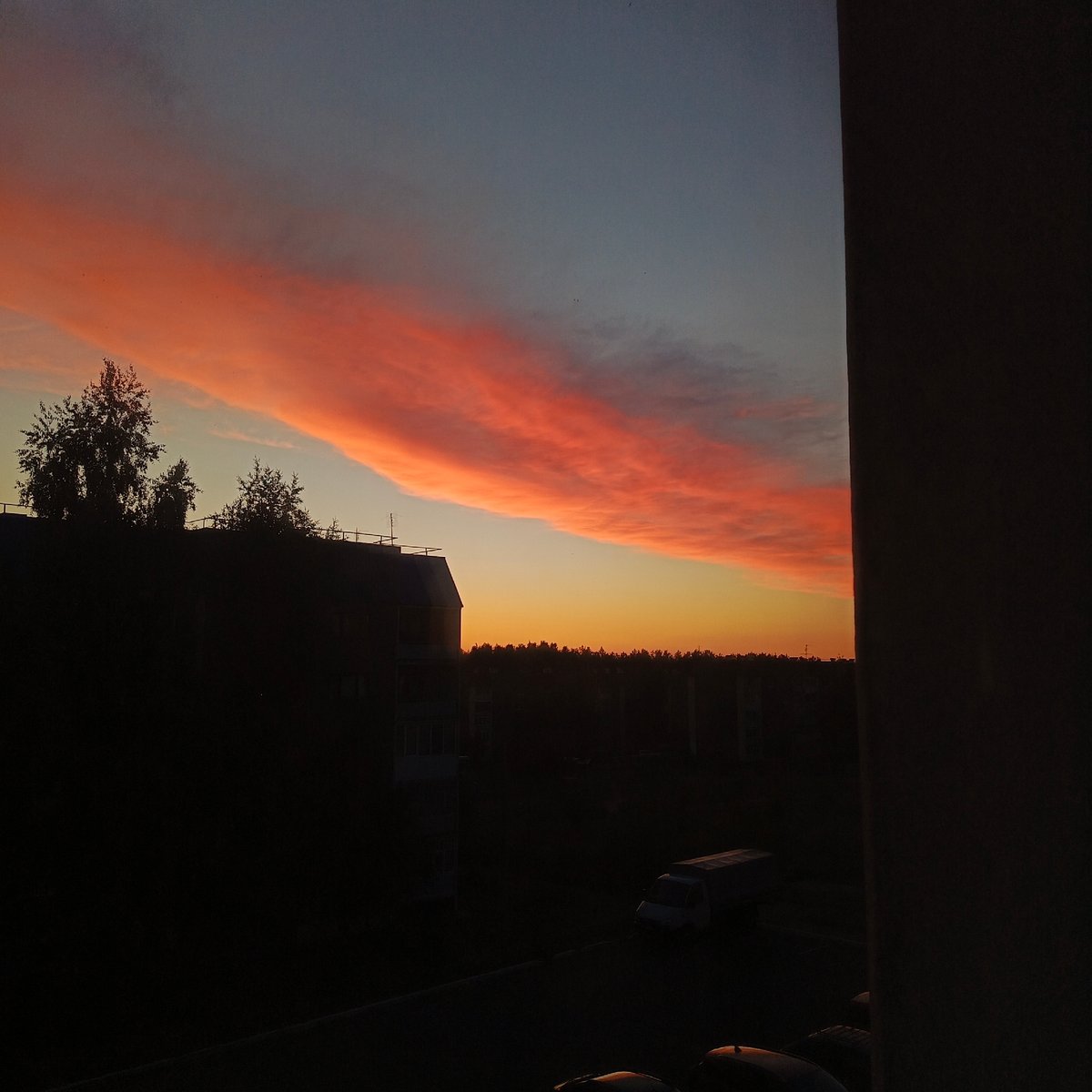 Dramatic sunset captured over Markovskii residential area with domestic moments