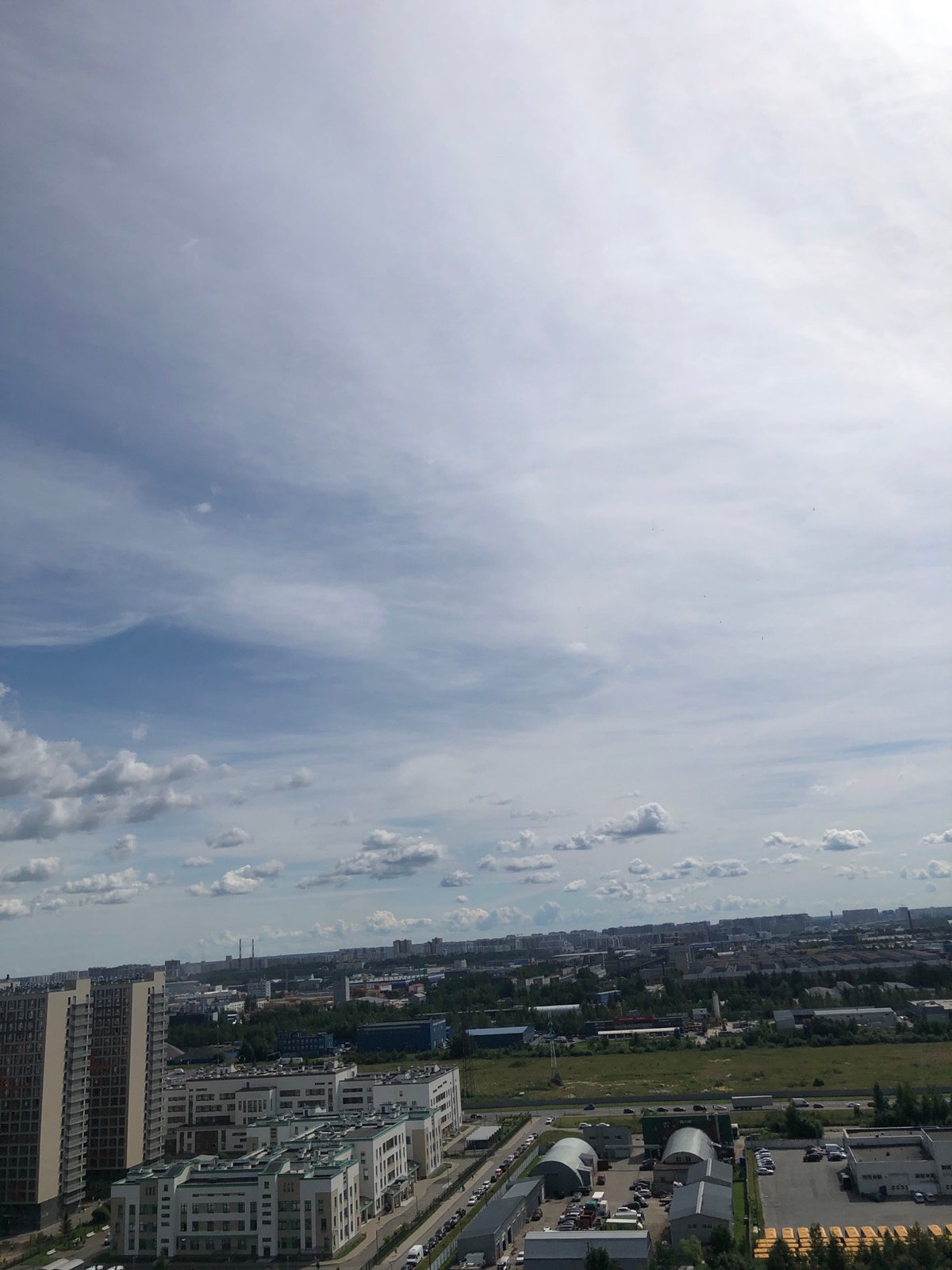 Multiple angles on a dense urban cityscape with towers and wide roads