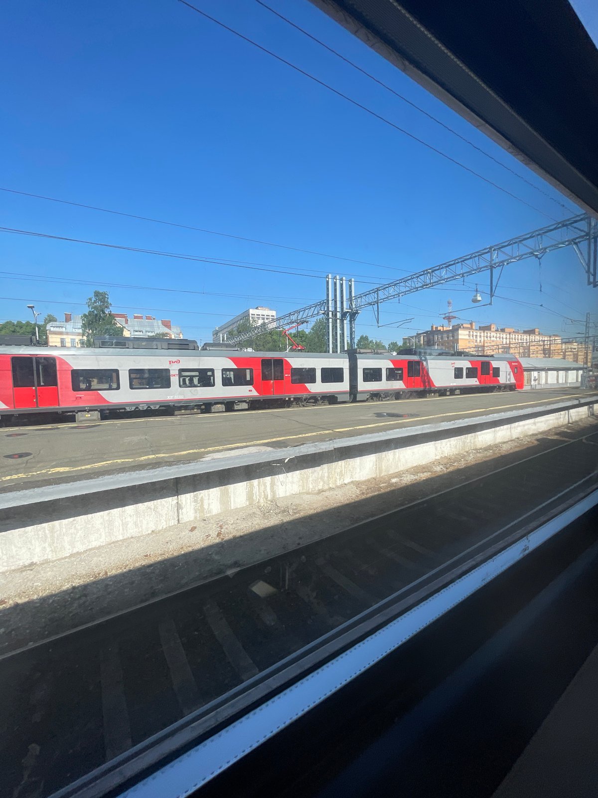 Electric train stationary at Saint Petersburg railway platform