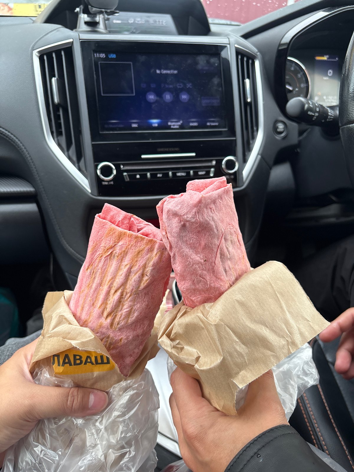 Late-night snack featuring pink flatbread wraps in Birobidzhan