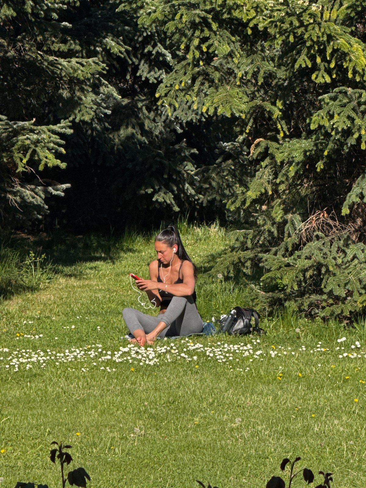 Woman takes break from cycling in Sofia park