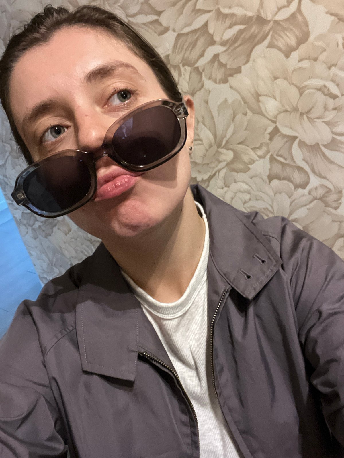 Person in sunglasses, grey jacket spotted in Krasnoyarsk locations