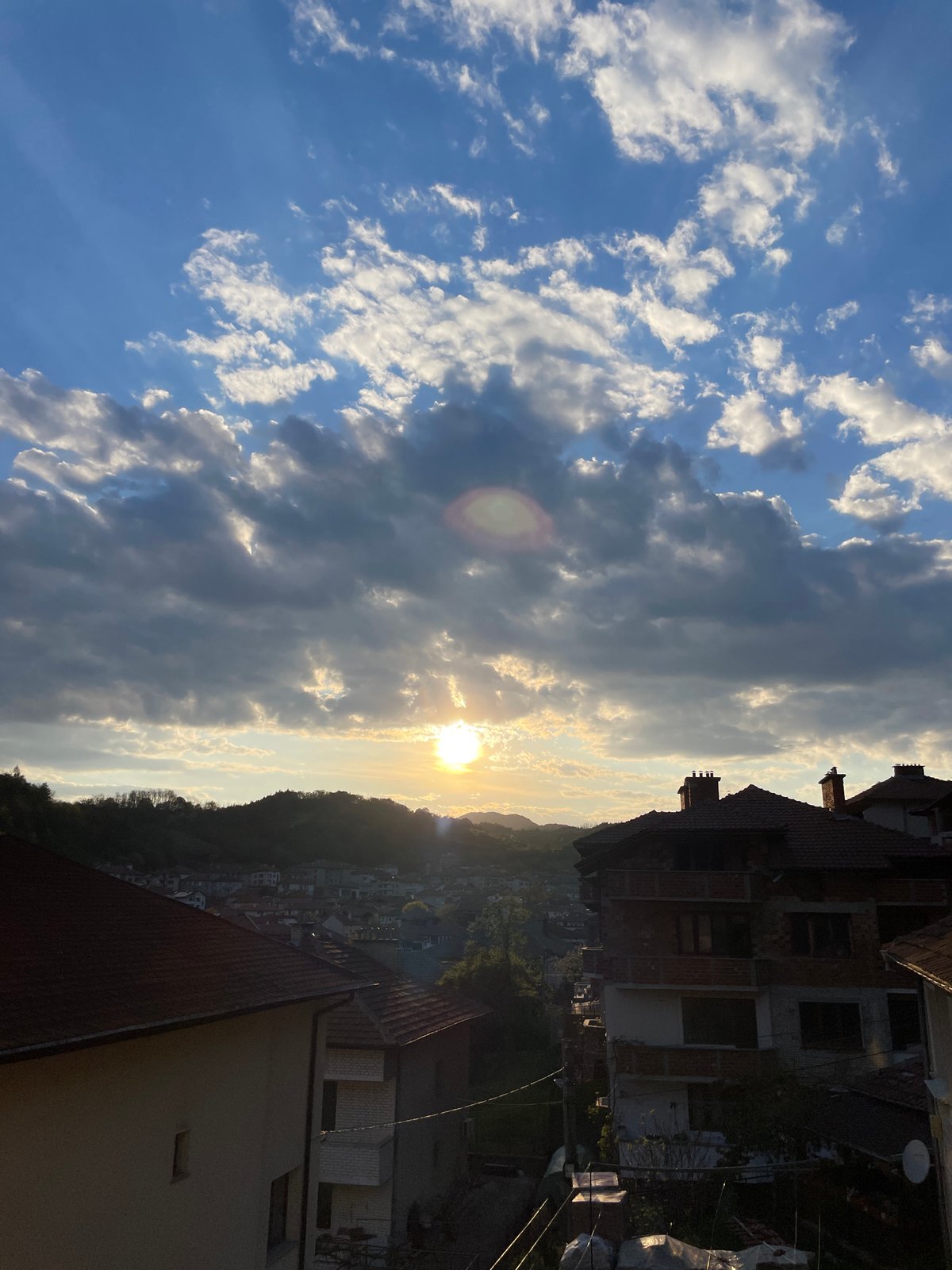 Sunset captured over red rooftops in Zlatograd, Bulgaria