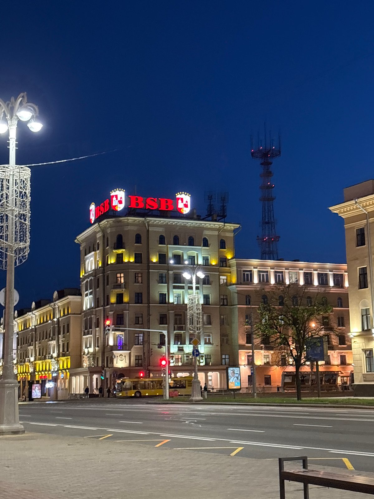 Evening scenes documented across central Minsk under crescent moon