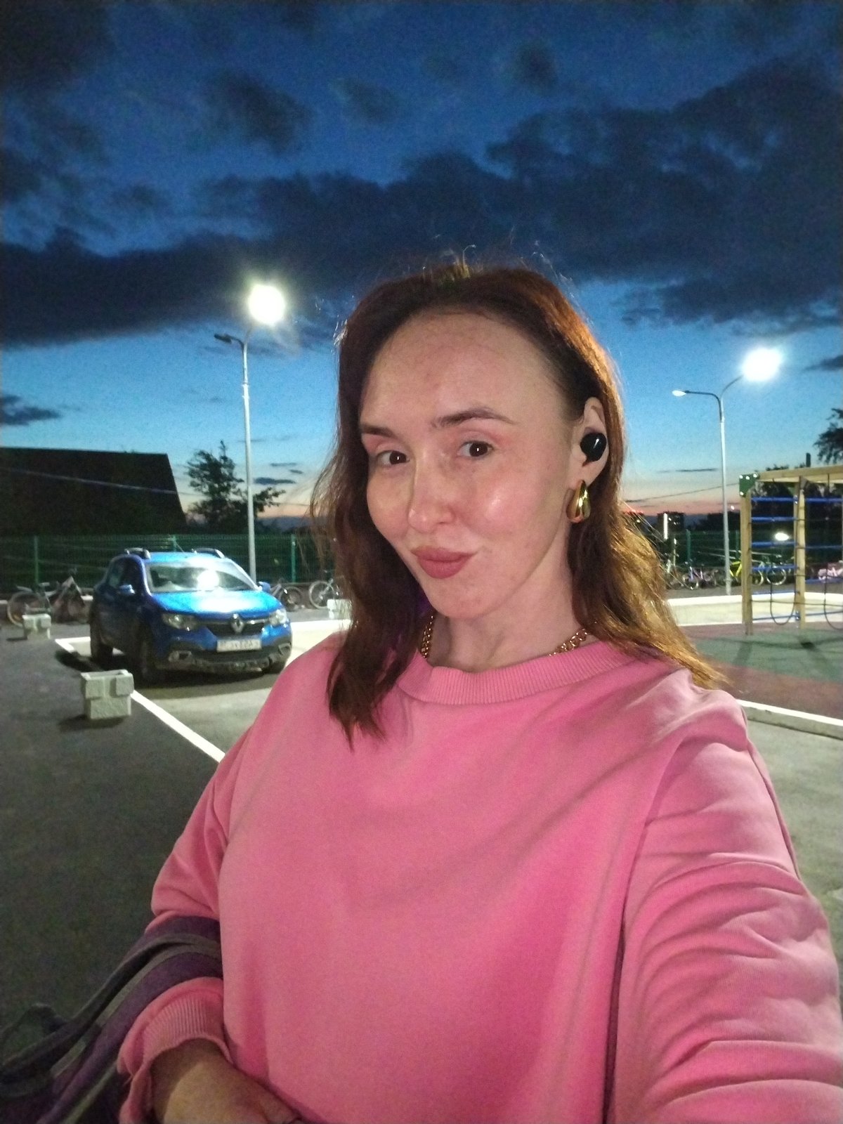Woman documents evening routine in Izhevsk residential area