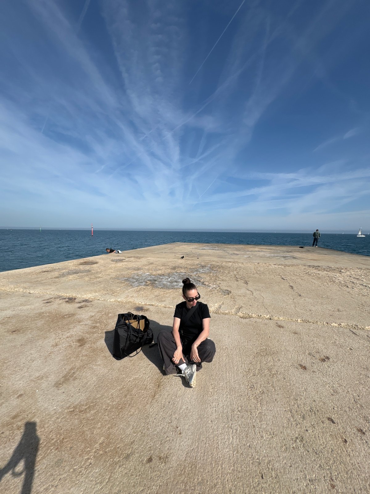 Afternoon leisure activities observed on Barcelona waterfront pier