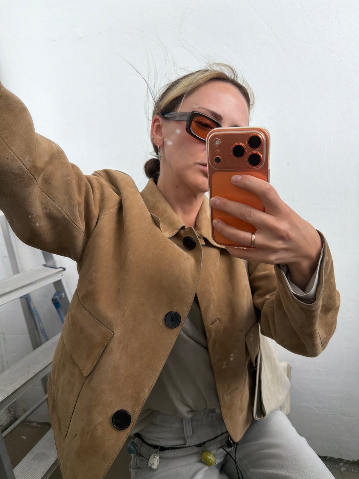 Person takes selfies during rainy day in Khimki, Russia