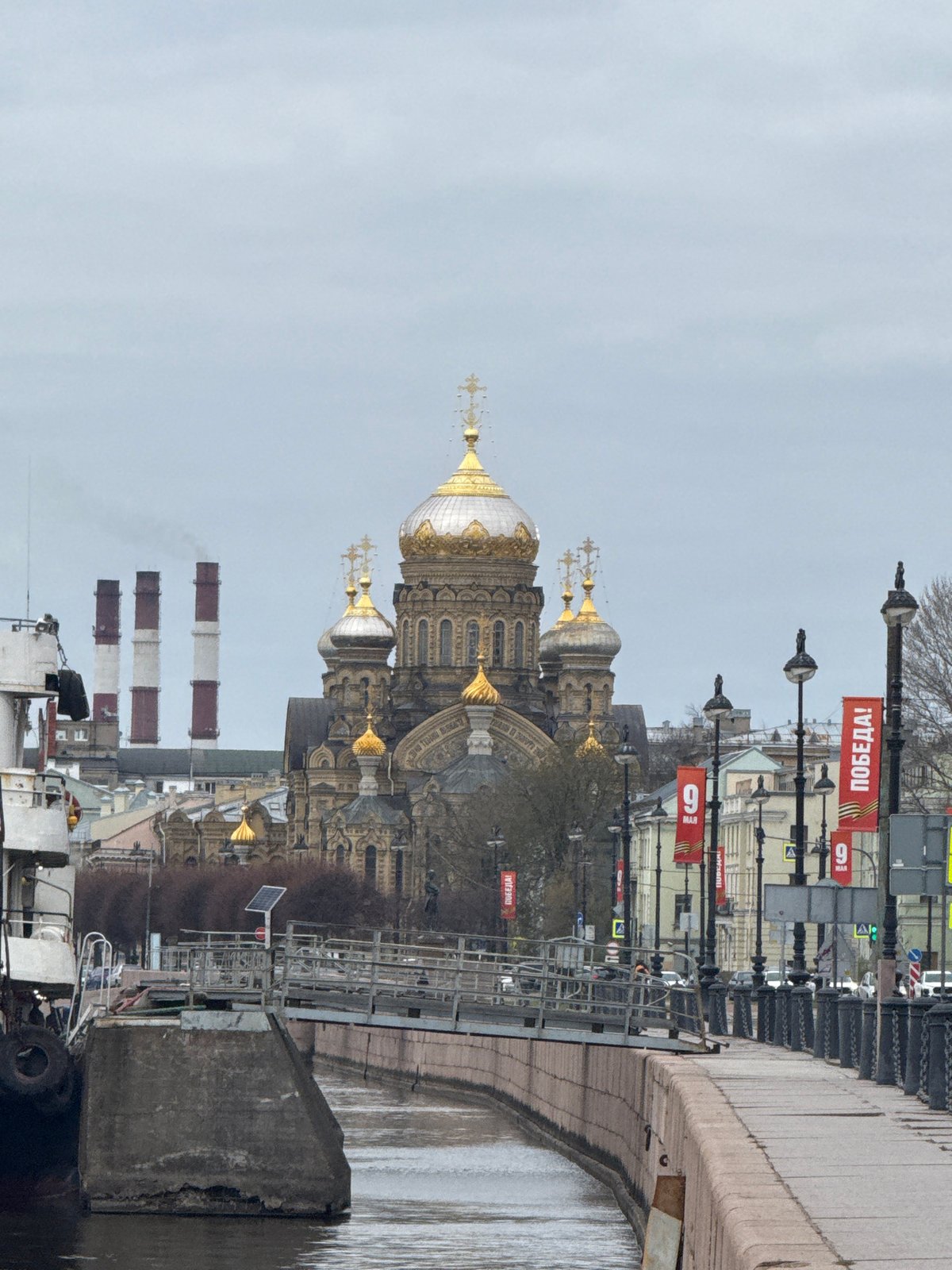 Golden-domed cathedral documented in Saint Petersburg morning scene
