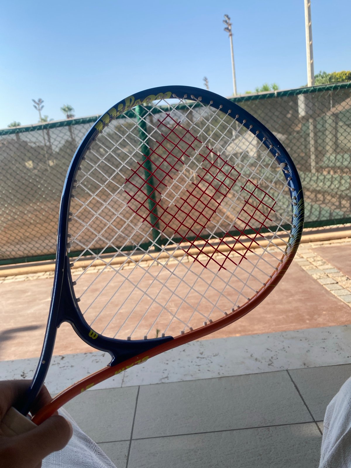 Afternoon tennis session at a clay court in Sheikh Zayed