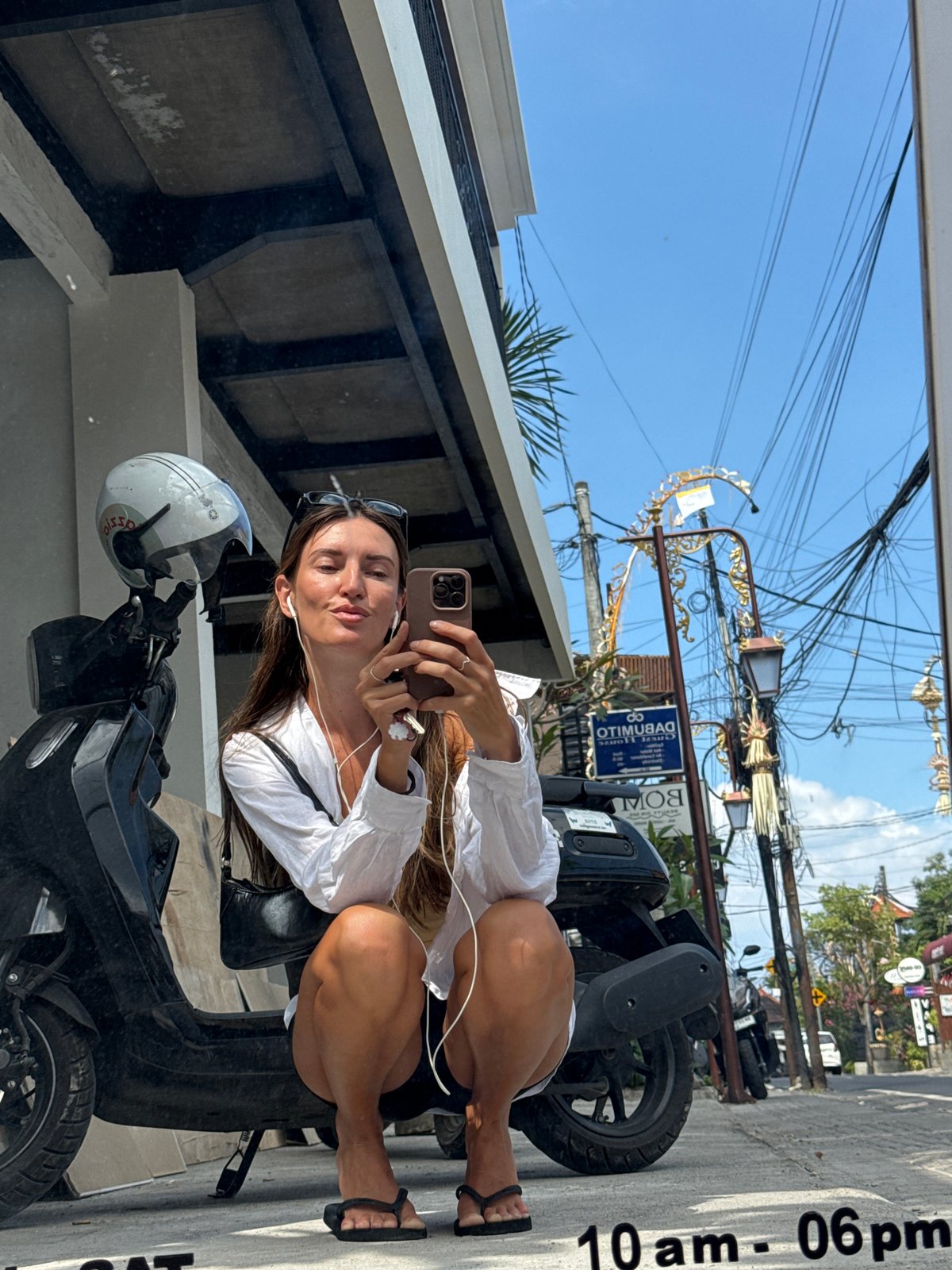 Mirror selfies outside a North Kuta nail salon