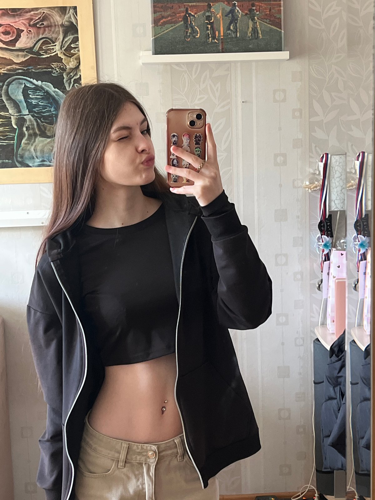 Woman Takes Mirror Selfies in Saint Petersburg Bedroom