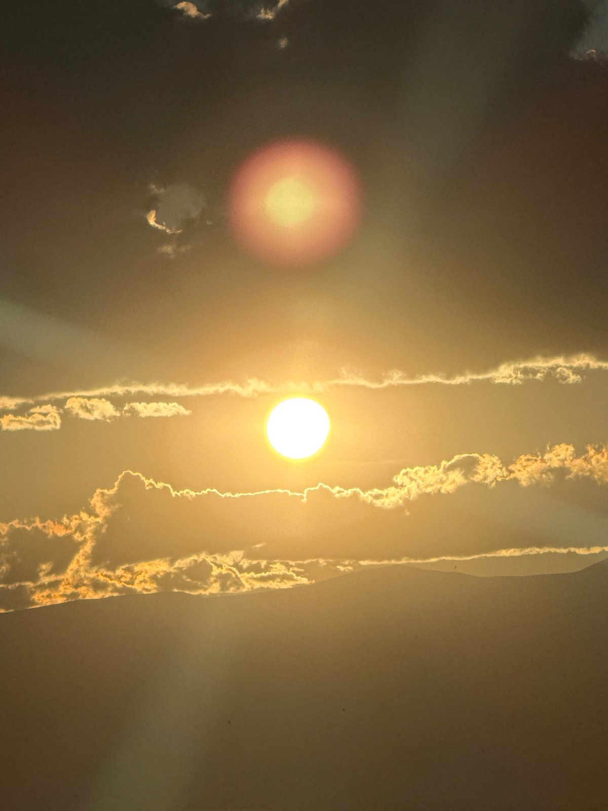 Dramatic sunset illuminates Abovyan, Armenia with golden light