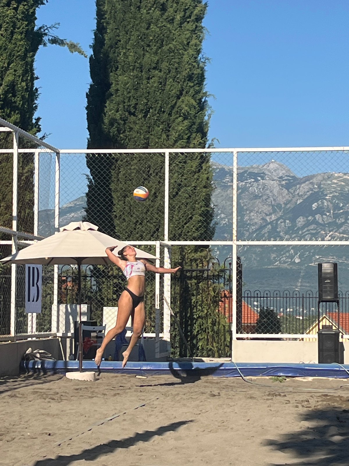 Beach volleyball match and sideline scenes in Gošići, Montenegro