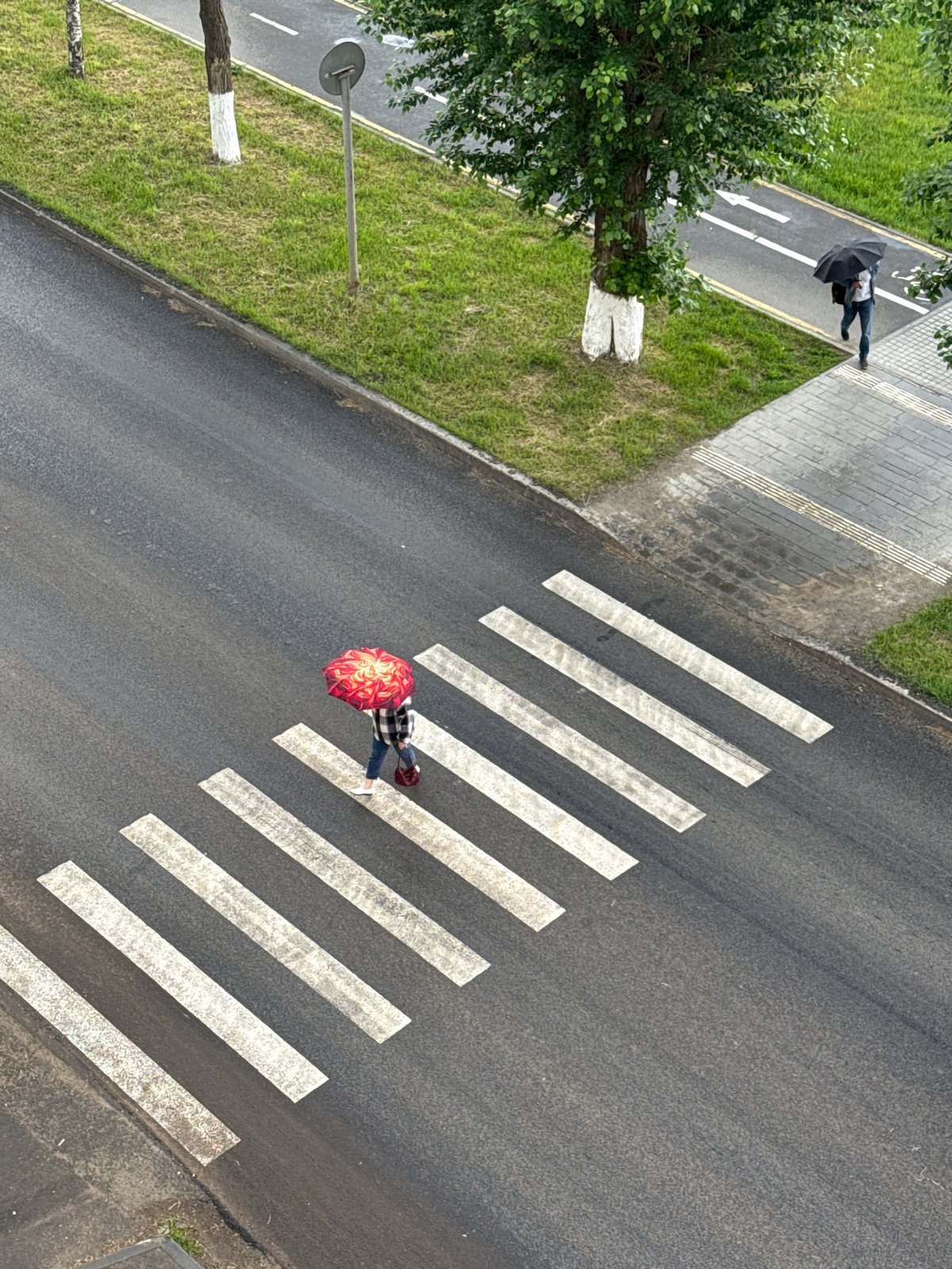 Aerial views document rainy day scenes across Votkinsk, Russia