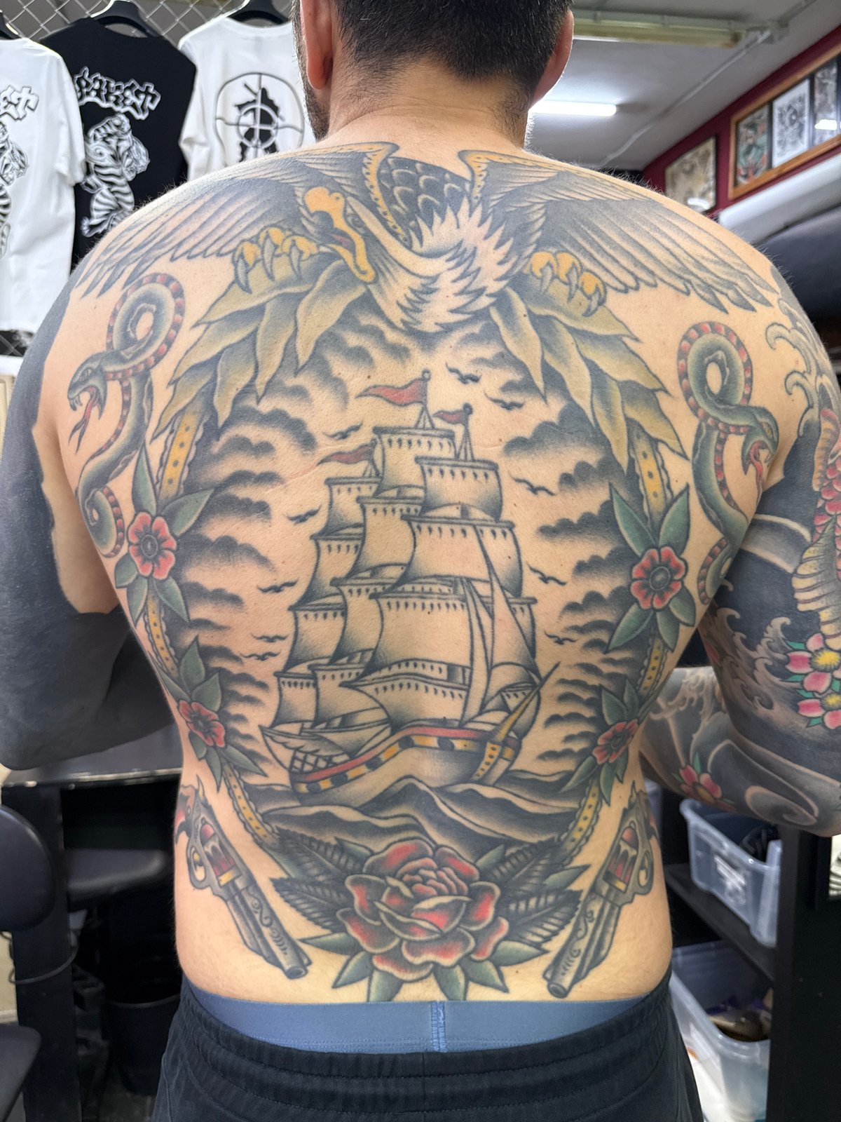 Heavily tattooed man spotted in Moscow with elaborate nautical back piece