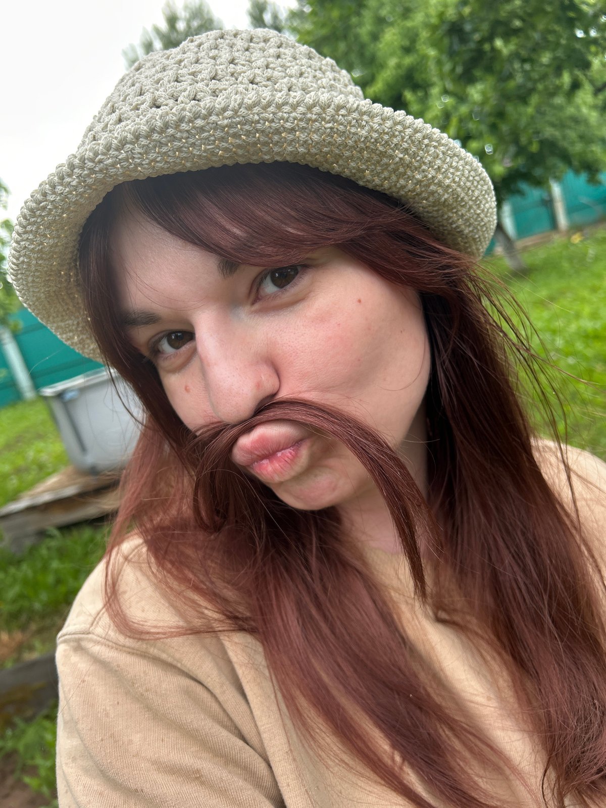 Woman poses for outdoor portrait session in rural Russia