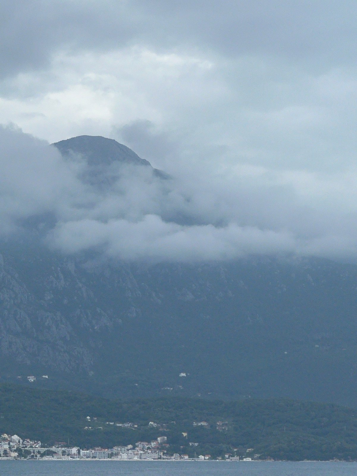 Clouded mountain photographed in coastal Luštica, Montenegro