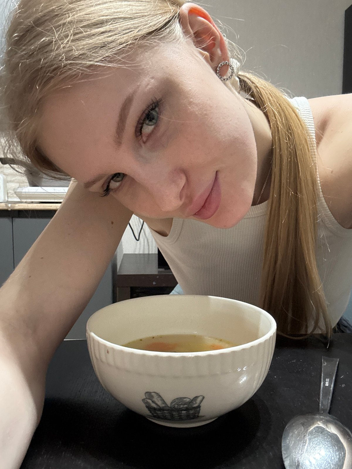 Woman photographed dining on soup in Perm, Russia