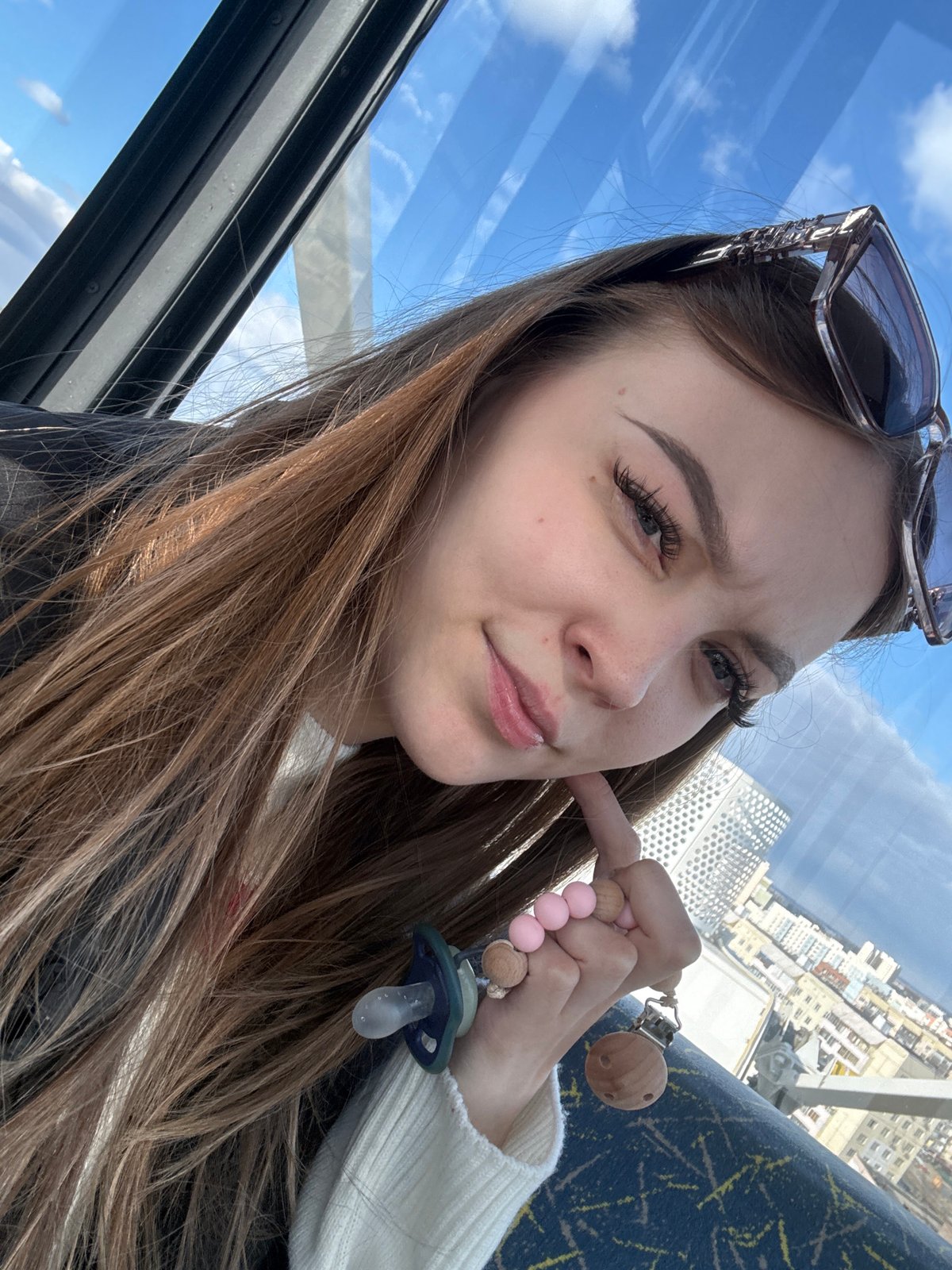 Ferris wheel riders capture cityscape views in Yakutsk