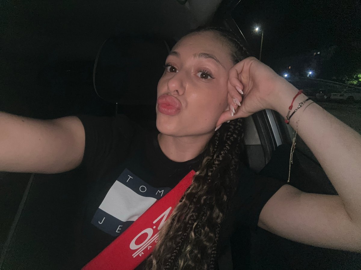 Young women take playful car selfies in Gabrovo Bulgaria