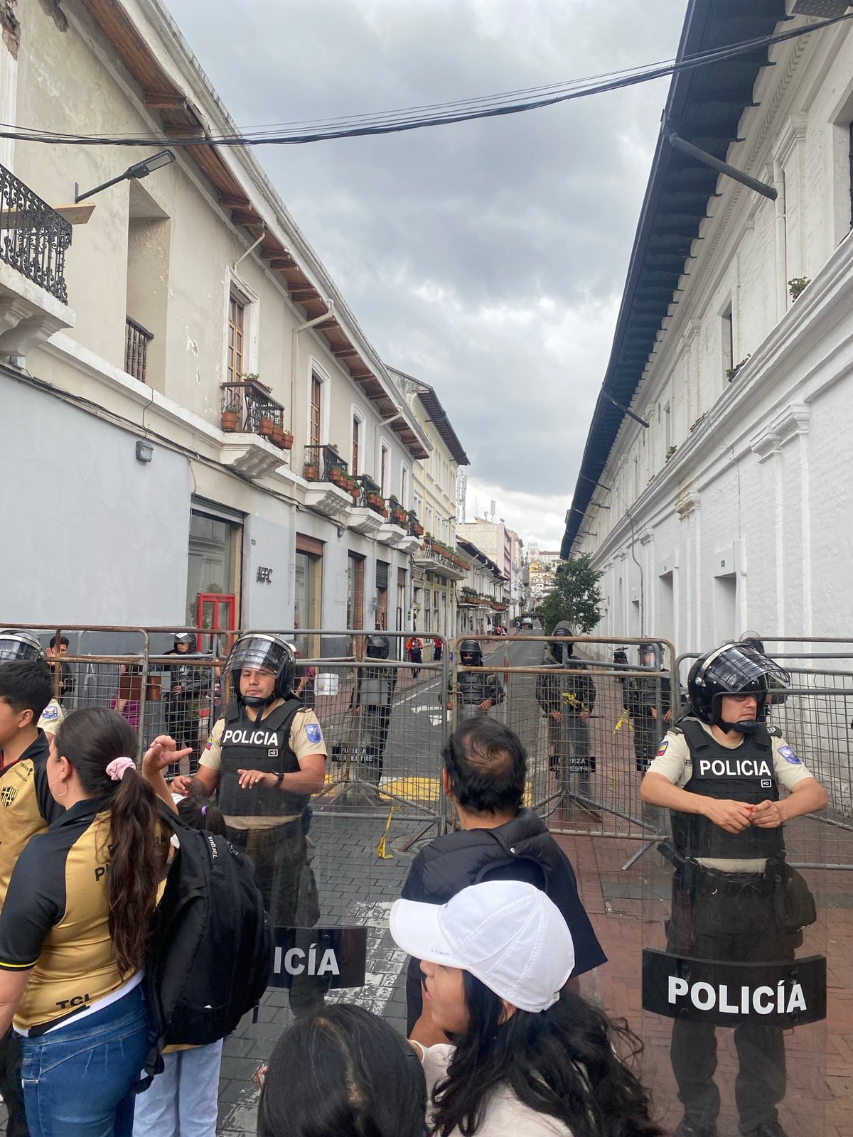 Police deploy as large crowds gather in Quito streets