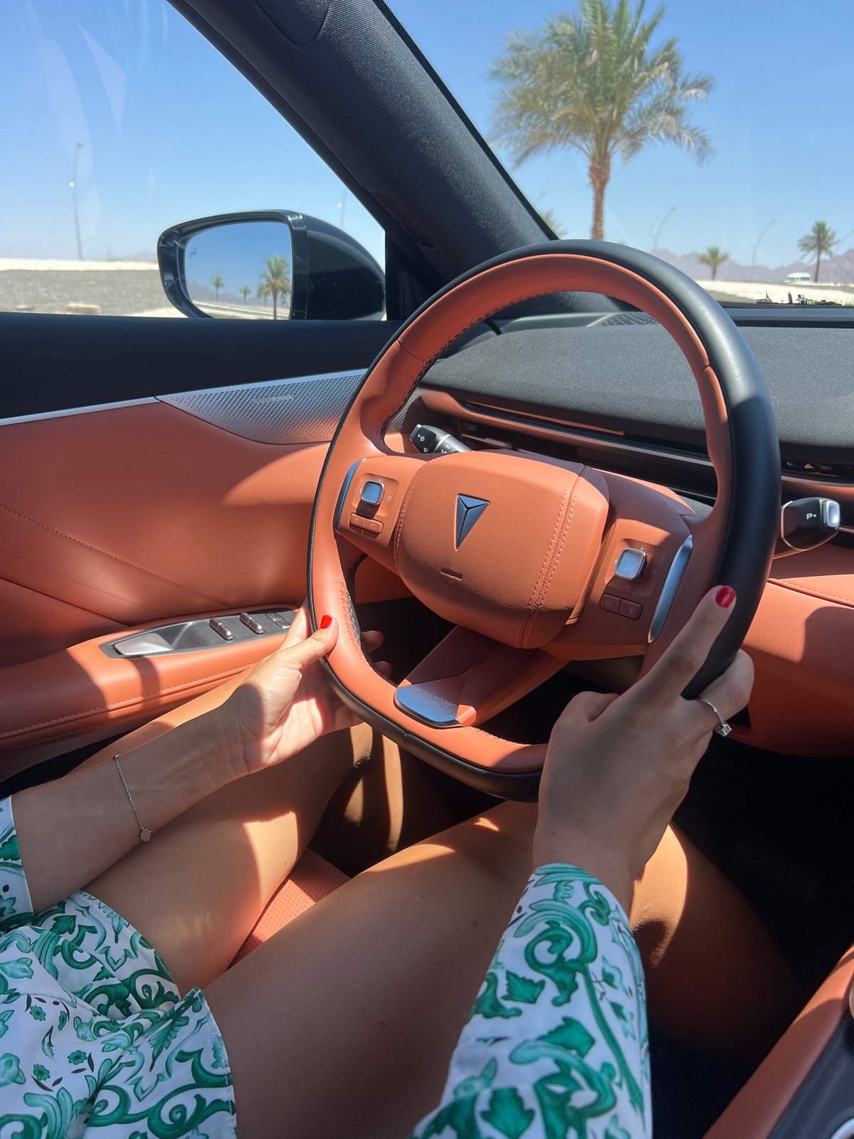 Driving through Sharm El Sheikh's palm-lined streets on a clear morning