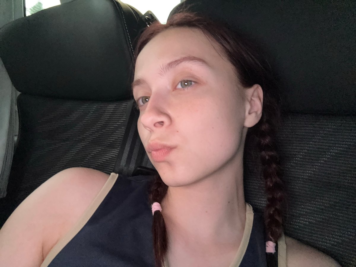 Young woman with braids observed in Podkurovka, Russia