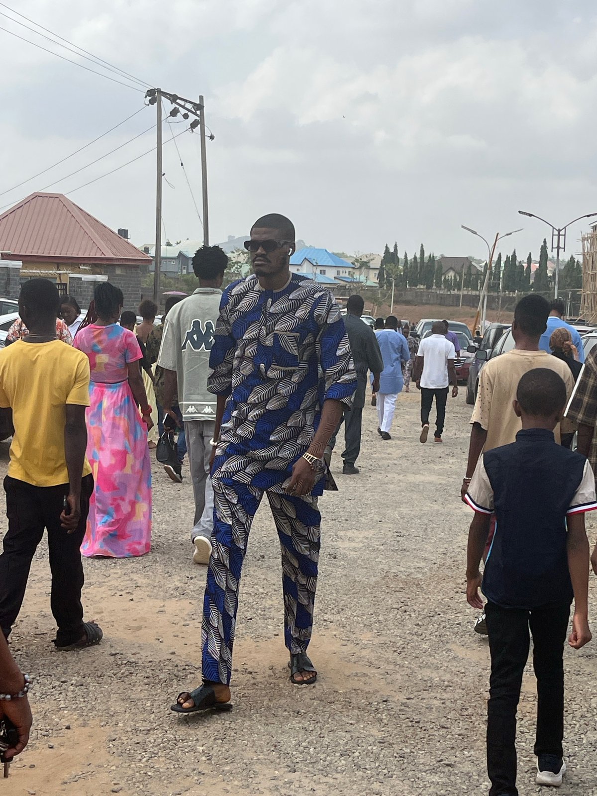 Morning street life and church gathering documented across Abuja