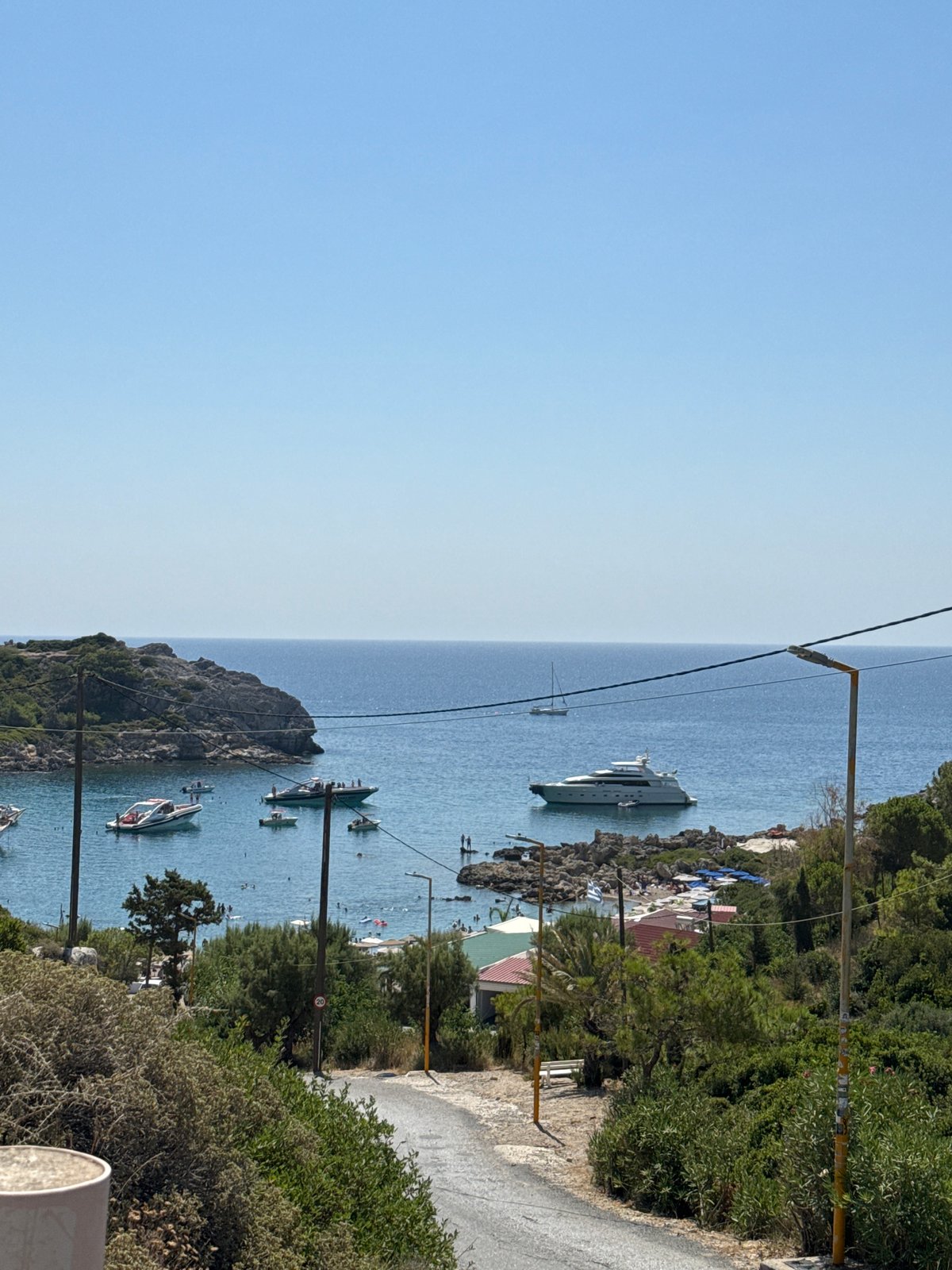 Clear skies over a Rhodes harbor from above