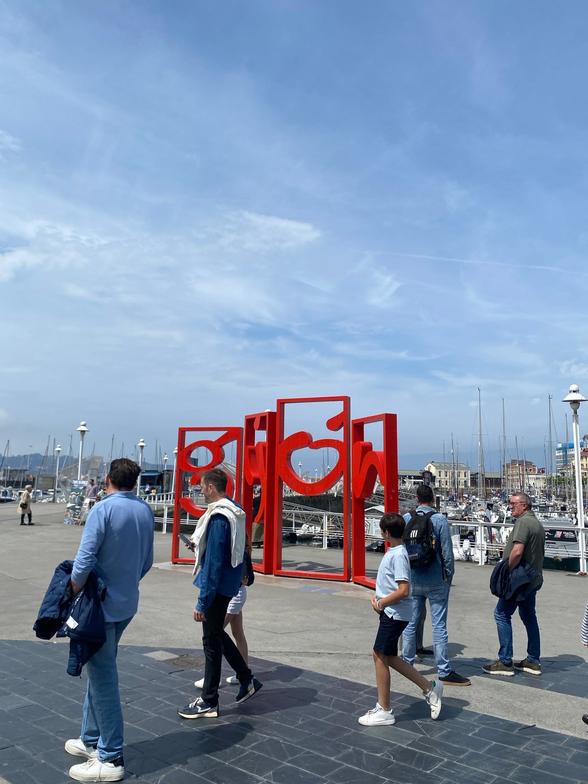 Everyday scenes documented across Gijón, Spain during lunch hour