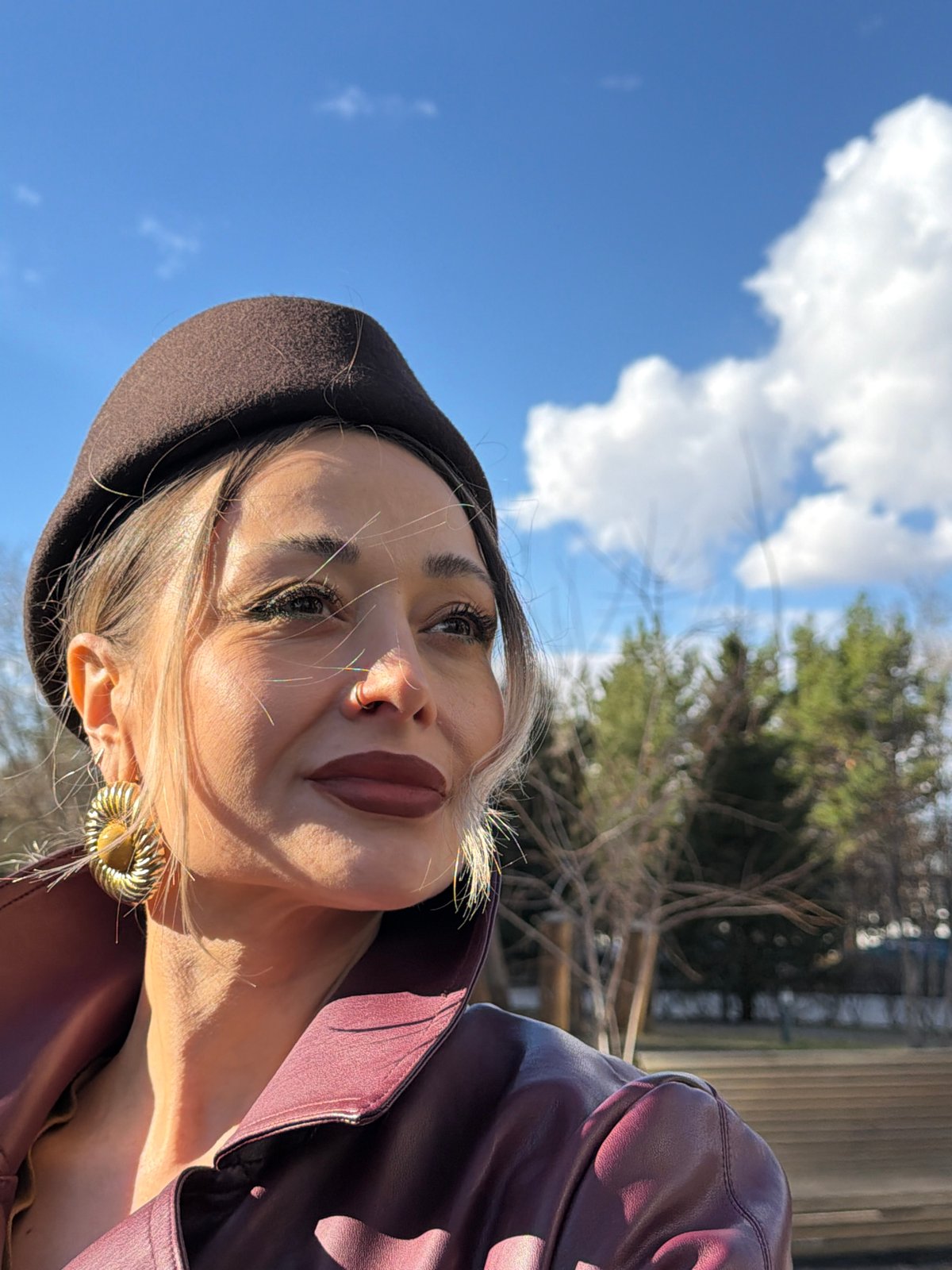 Woman poses for photo session at Krasnoyarsk plaza