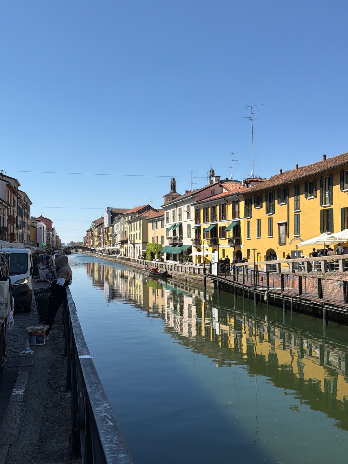Spring morning scenes captured across Milan's canals and streets