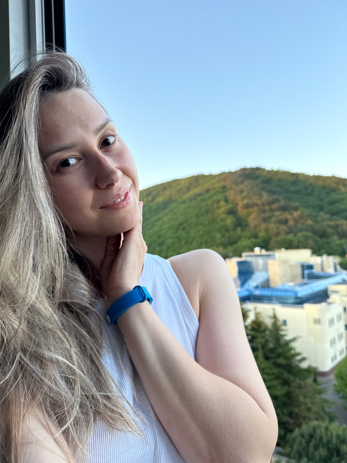 Woman takes selfie portraits in Nebug, Russia
