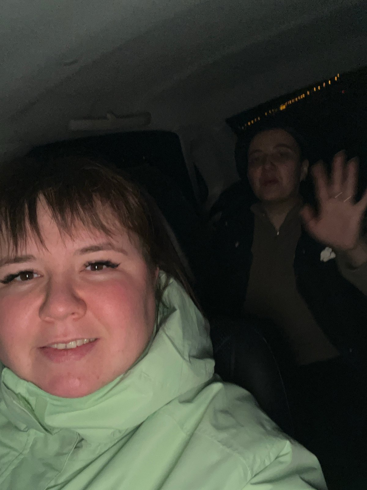 Two people share moment in dimly lit Chaikovsky selfie