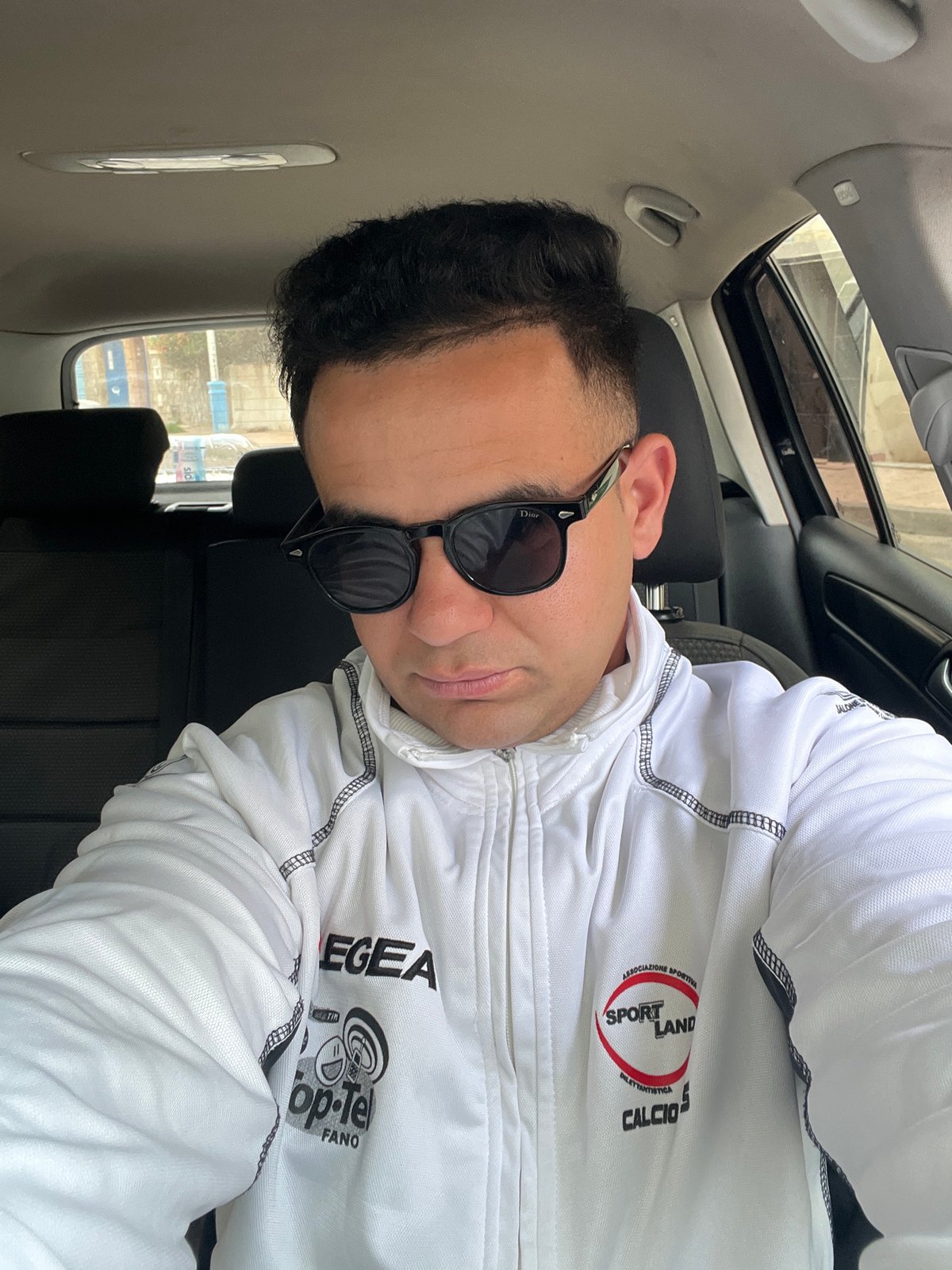 Man Takes Car Selfies in Martil, Morocco