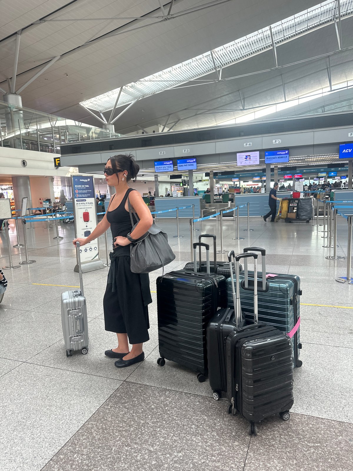 Woman with suitcase spotted at Thuận An airport