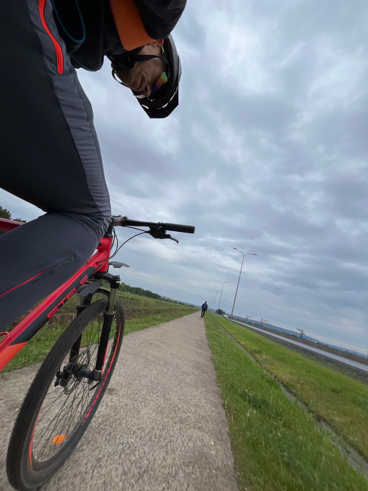 Cyclist spotted on paved path in Chaikovsky, Russia