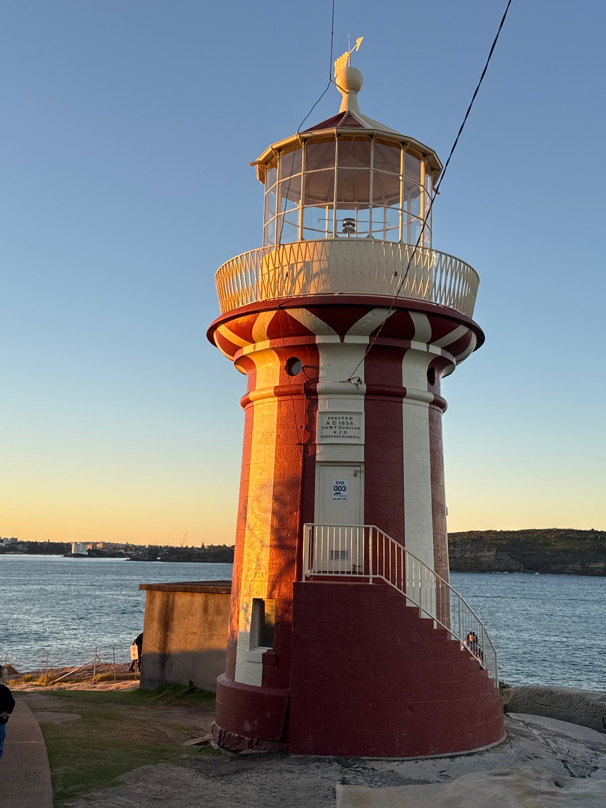 Sydney's southern coastline at sunrise, lighthouse to rocky shore