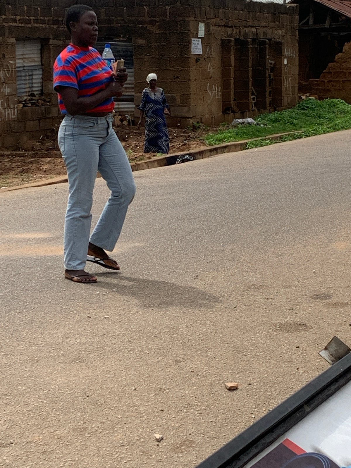 Daily life scenes across Jos, Nigeria streets and buildings