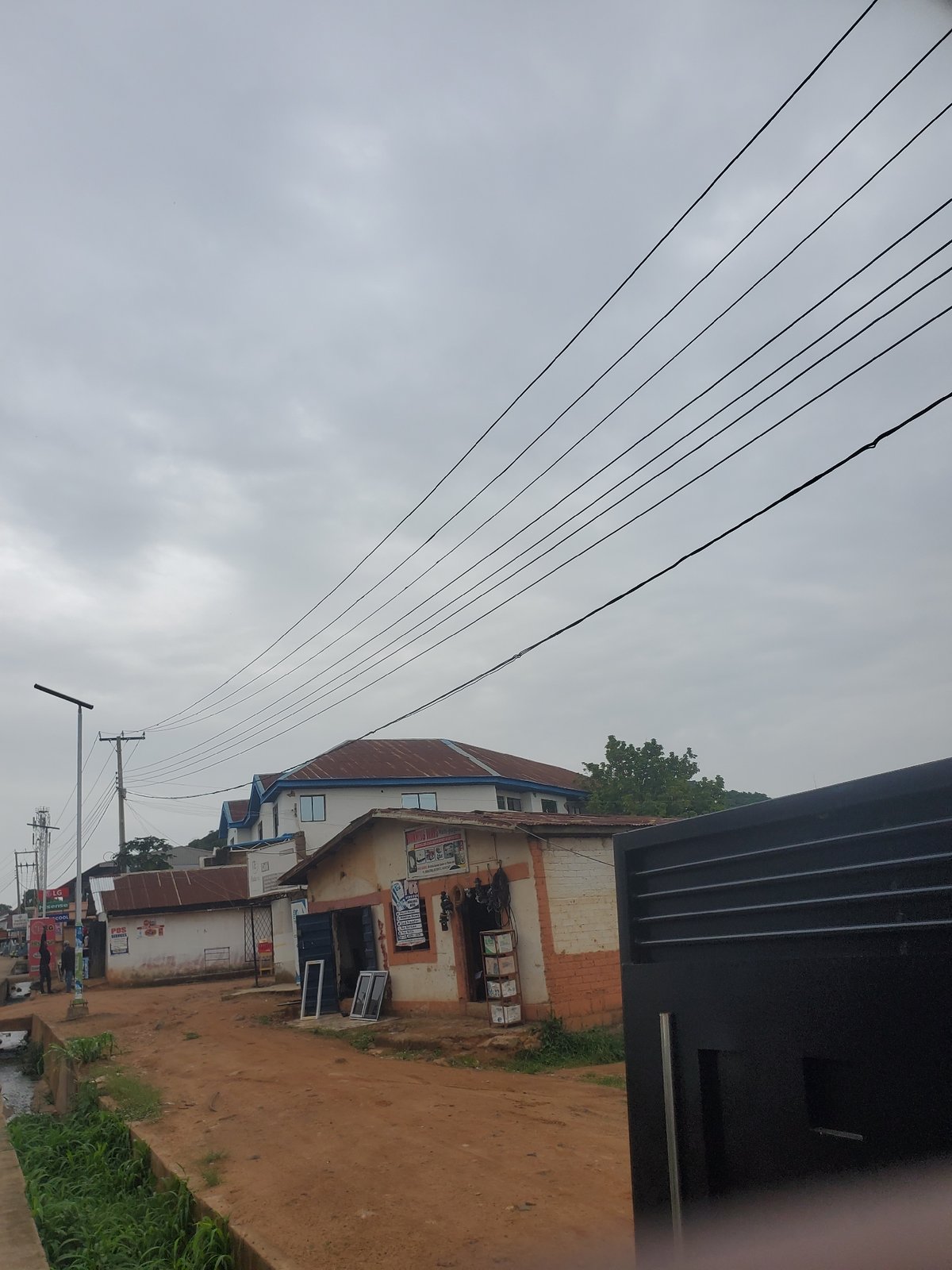 Street-level look at Jos infrastructure, signage, and daily activity