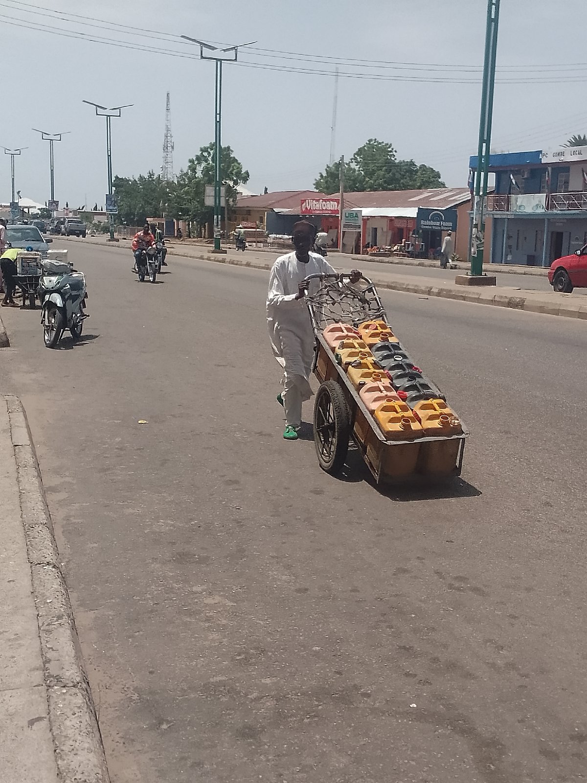 Street vendors, construction worker active in urban district