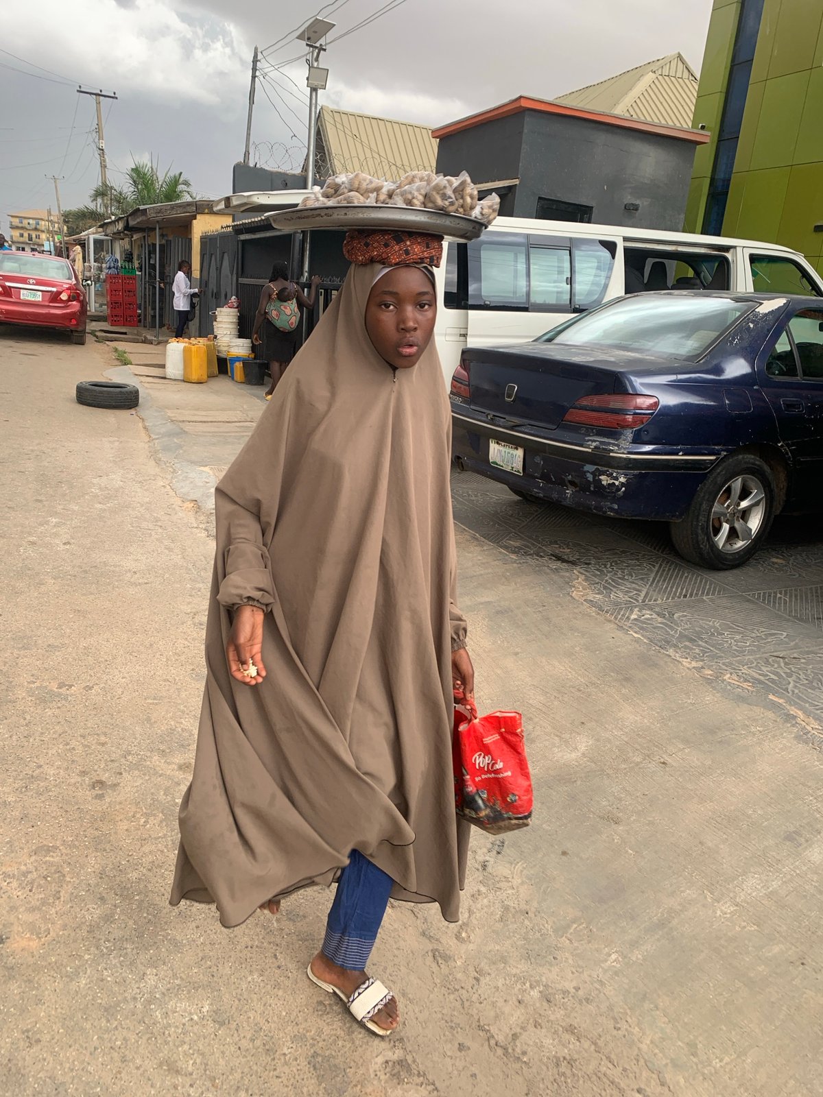 Everyday life portraits and street scenes documented in Jos, Nigeria