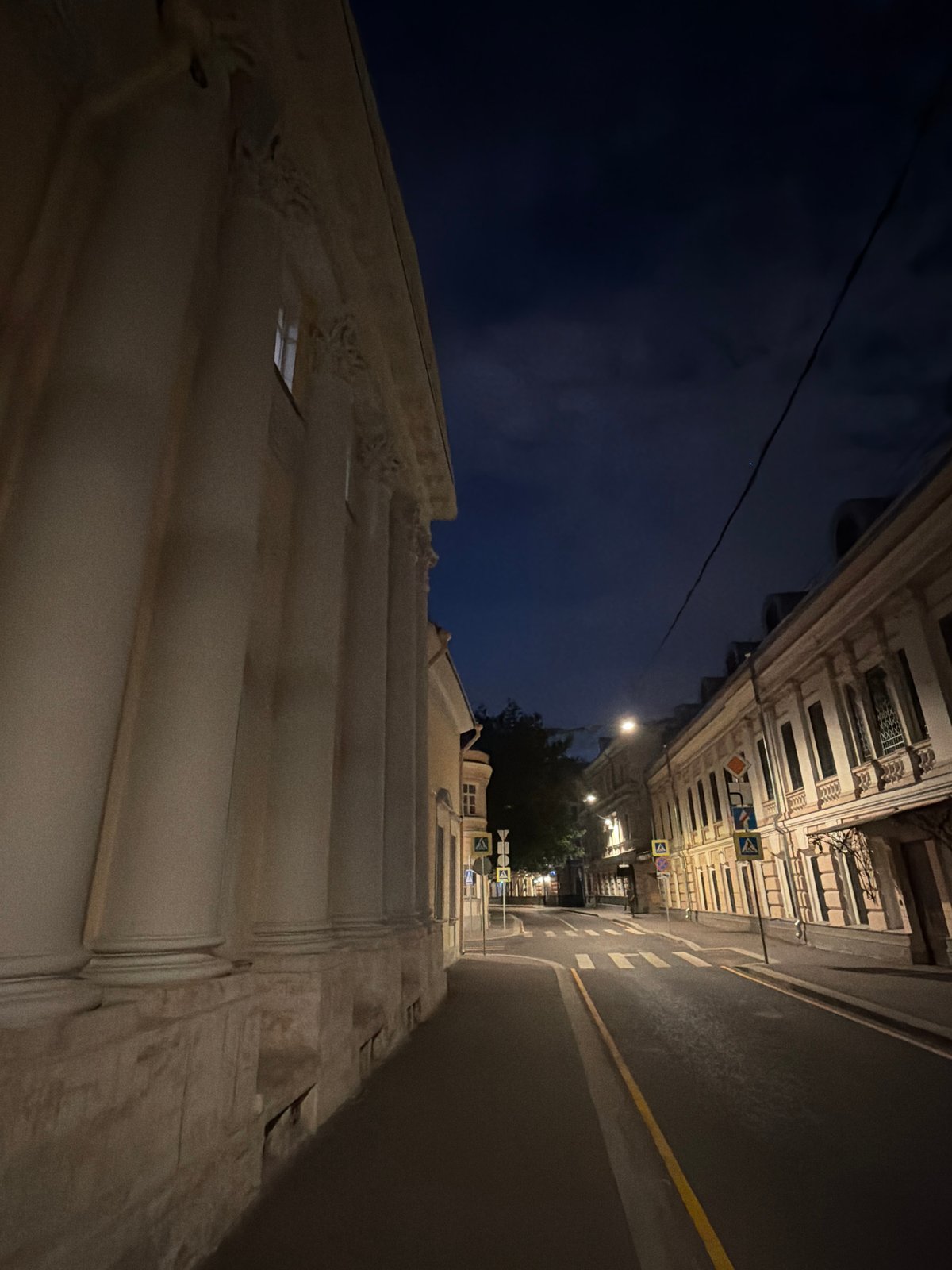 Moscow evening scenes showcase illuminated historic architecture around Chistye Prudy